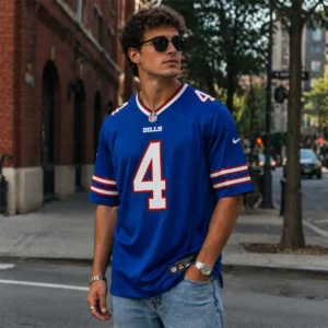 Young man wearing James Cook Buffalo Bills jersey in a casual street style outfit.