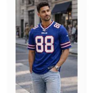 Male model wearing Dawson Knox Buffalo Bills Royal Blue Jersey on a city street lifestyle photography
