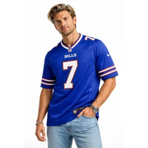 A blonde male model wearing the official Ray Davis #7 Buffalo Bills royal blue jersey, standing in a white studio setting.
