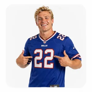 A smiling fan wearing the Buffalo Bills #22 Gardner-Johnson blue home jersey against a white background.