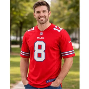 A smiling man outdoors wearing a red Buffalo Bills number 8 jersey, showcasing a comfortable lifestyle fit.