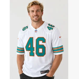A smiling male model wearing the white Tucker Addington Miami Dolphins jersey with number 46.