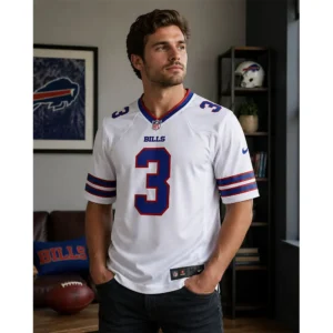 A man wearing a Damar Hamlin white Buffalo Bills jersey in a home setting, showcasing the fit and athletic design of the apparel.
